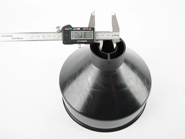 A capillary is measuring the inner diameter of PE funnel