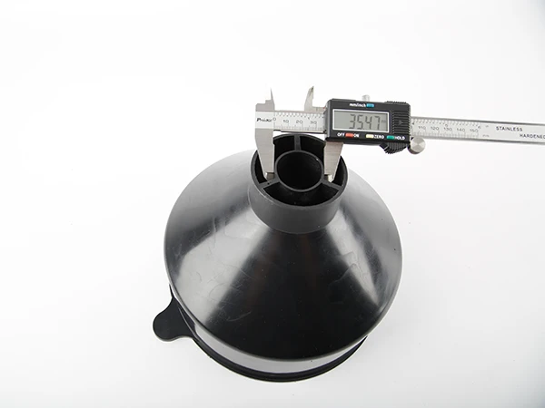 A capillary is measuring the outer diameter of PE funnel