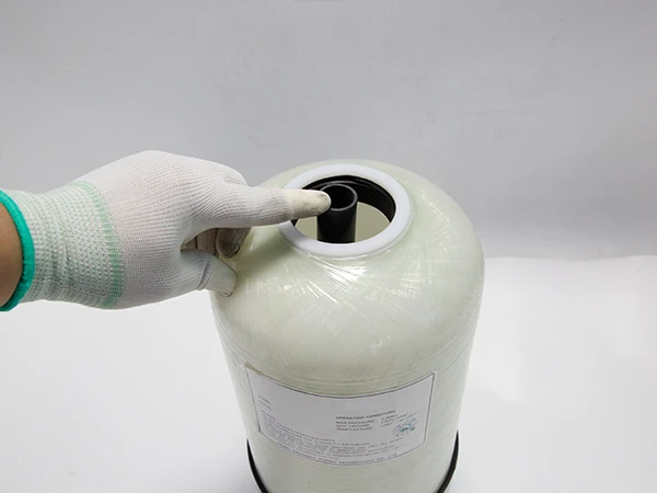 A worker puts the central tube in position.