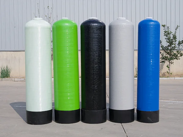 Five different colors of FRP tanks in the yard.