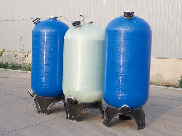 Three FRP tanks with upper loading and lower discharge port.