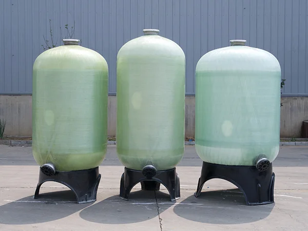 Three FRP tanks with upper loading and lower discharge port.